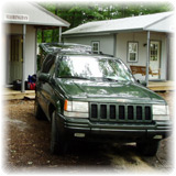 Adrian parked in front of our cabin in Richmond VA